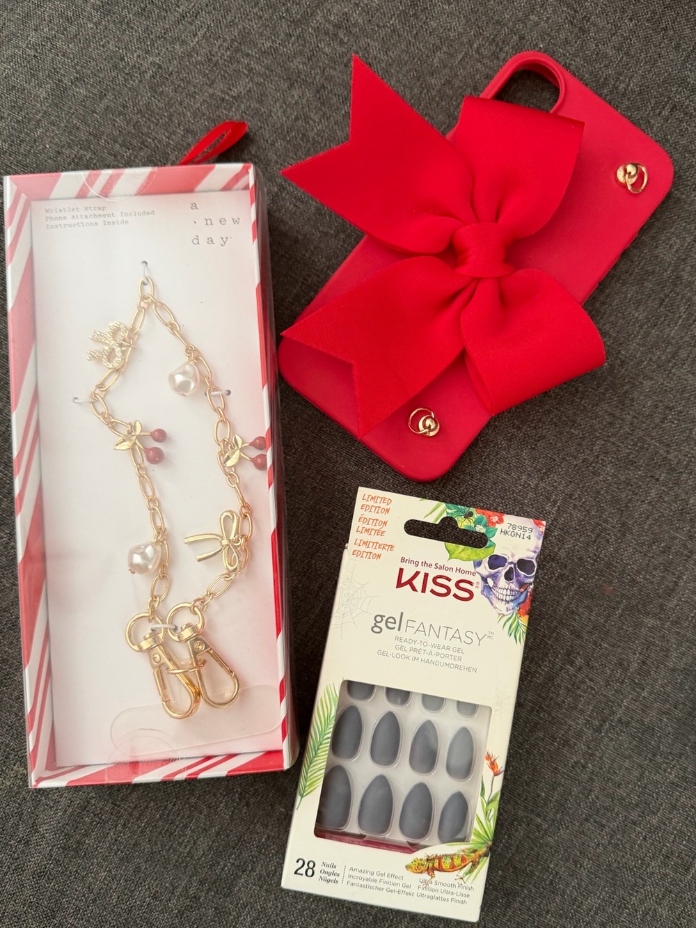 Kiss Red Bow IPhone 16 Case with Gold Wrislet wrap phone attachment & Kiss gel